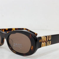 Miu Miu MU 06ZS (1425S0) Women's Sunglasses ✨