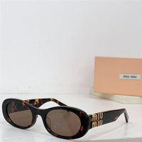 Miu Miu MU 06ZS (1425S0) Women's Sunglasses ✨