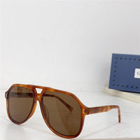 Gucci GG1042 Sunglasses feature a rectangular Pilot ✨