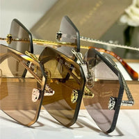 Bvlgari BV40026U  Serpenti Oversized Rimless Irregular Sunglasses ✨