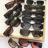 PRADA SPR09Z Sunglasses with triangle logo 🟥