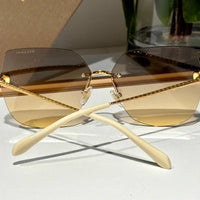 Bvlgari BV 40030 Serpenti Oversized Rimless Irregular Sunglasses ✨