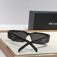 PRADA SPR09Z Sunglasses with triangle logo 🟥