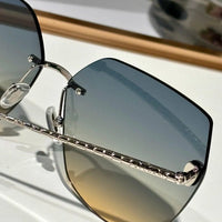 Bvlgari BV 40030 Serpenti Oversized Rimless Irregular Sunglasses ✨