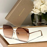 Bvlgari BV 40030 Serpenti Oversized Rimless Irregular Sunglasses ✨