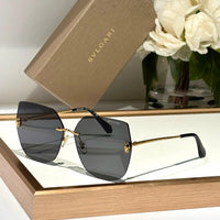 Bvlgari BV 40030 Serpenti Oversized Rimless Irregular Sunglasses ✨