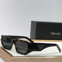 PRADA SPR09Z Sunglasses with triangle logo 🟥