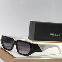 PRADA SPR09Z Sunglasses with triangle logo 🟥