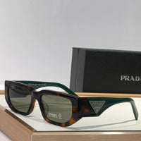 PRADA SPR09Z Sunglasses with triangle logo 🟥