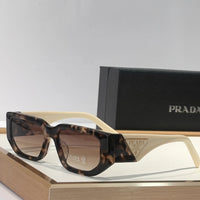 PRADA SPR09Z Sunglasses with triangle logo 🟥