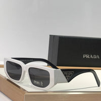 PRADA SPR09Z Sunglasses with triangle logo 🟥