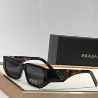 PRADA SPR09Z Sunglasses with triangle logo 🟥
