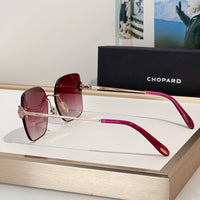 Chopard VCHL60S - 08FC Polished Copper Woman Sunglasses  ✨