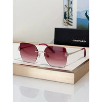 Chopard VCHL60S - 08FC Polished Copper Woman Sunglasses  ✨