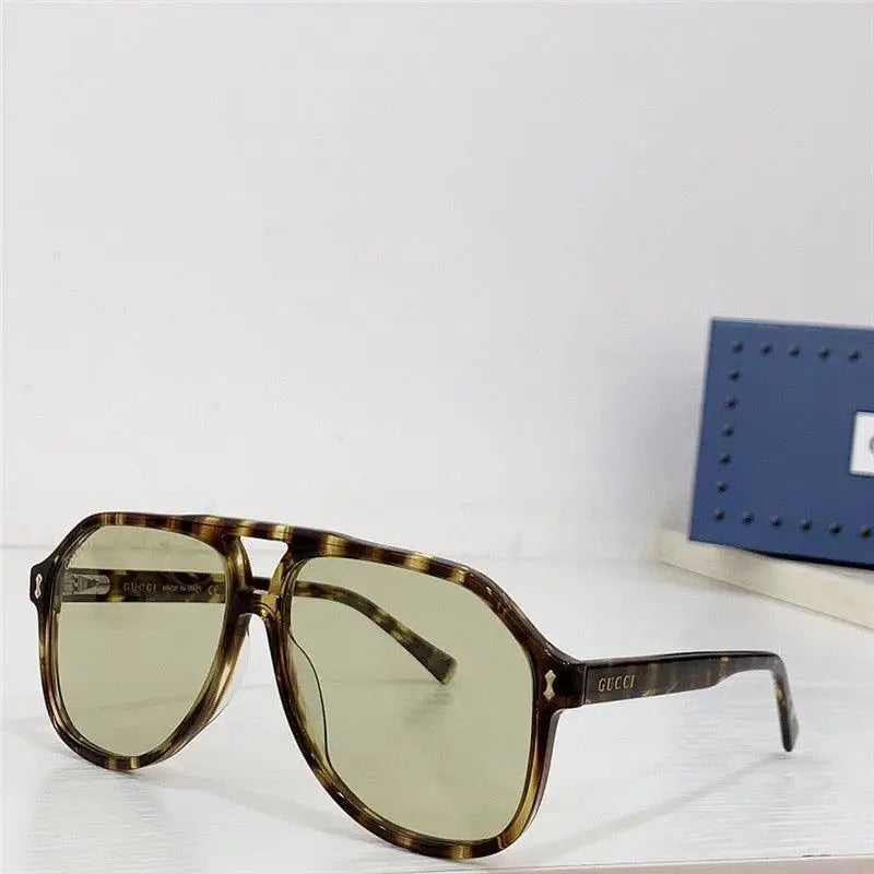 Gucci GG1042 Sunglasses feature a rectangular Pilot ✨