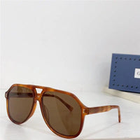 Gucci GG1042 Sunglasses feature a rectangular Pilot ✨