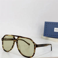 Gucci GG1042 Sunglasses feature a rectangular Pilot ✨
