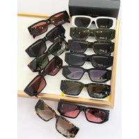 PRADA SPR09Z Sunglasses with triangle logo 🟥